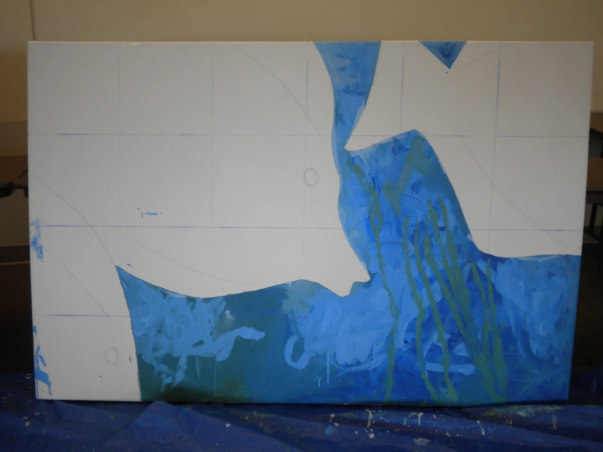 Another panel underway, blue water and green seaweed worked in around the reserved white fish