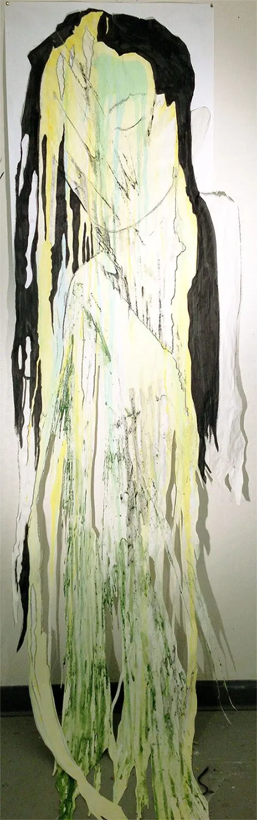A tall panel, black running down either side of a pale yellow and green form that trails into ribbons at the floor