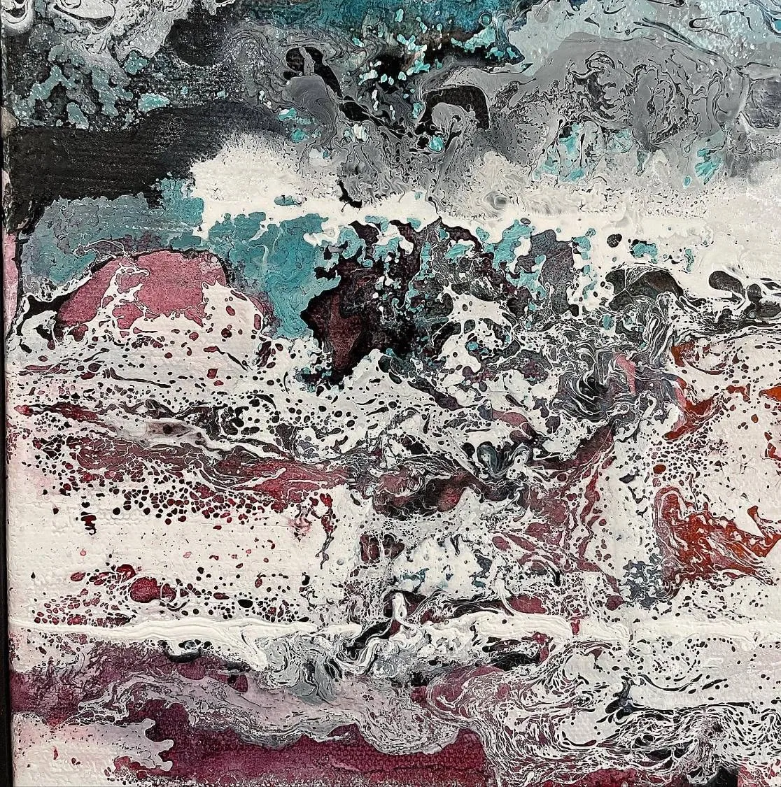 Detail of the second painting, white foam spattered black over a bed of plum and rust