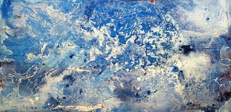 A wide field of marbled blue and white, veined and pooling like water in motion