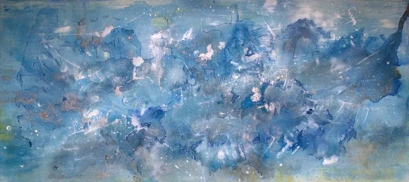 A field of deep and pale blue, flecked with white and rust, drifting like sediment through water